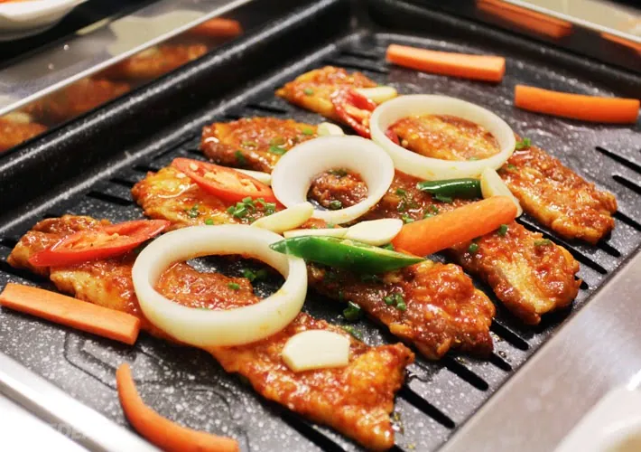 Điểm danh những món ngon Hàn Quốc bạn nên thưởng thức THỊT CỔ HEO NƯỚNG