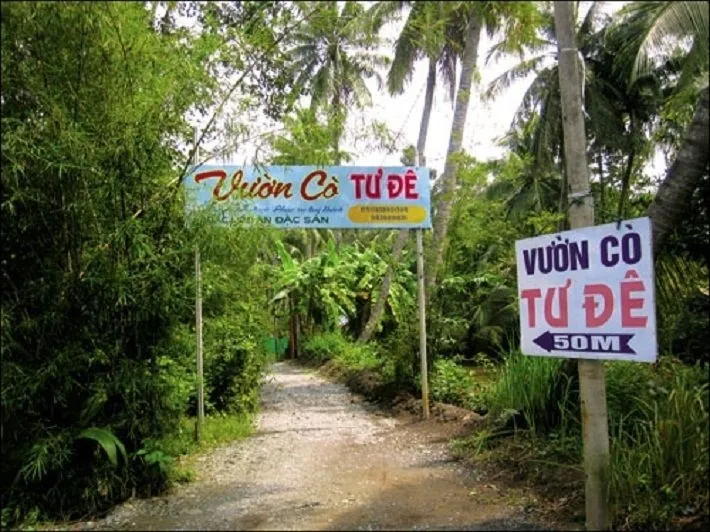 Quận 9 có gì chơi bên chốn thanh bình giữa đất Sài Gòn Lối vào vườn cò Tư Đê đem lại cho ta cảm giác thân quen chôn quê nhà